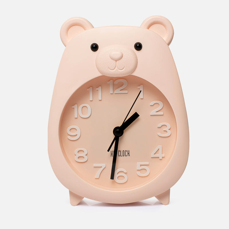 Reloj despertador forma de Osito rosado Este reloj despertador tiene un diseño hermoso y cute, puedes programar tu alarma de manera facil y sencilla. Te permitirá llegar siempre puntual a cualquier evento programado. Disponible en varios colores: rosado, amarillo y verde. Como todos los productos de blinkaccesorios, este reloj cuenta con la garantía.