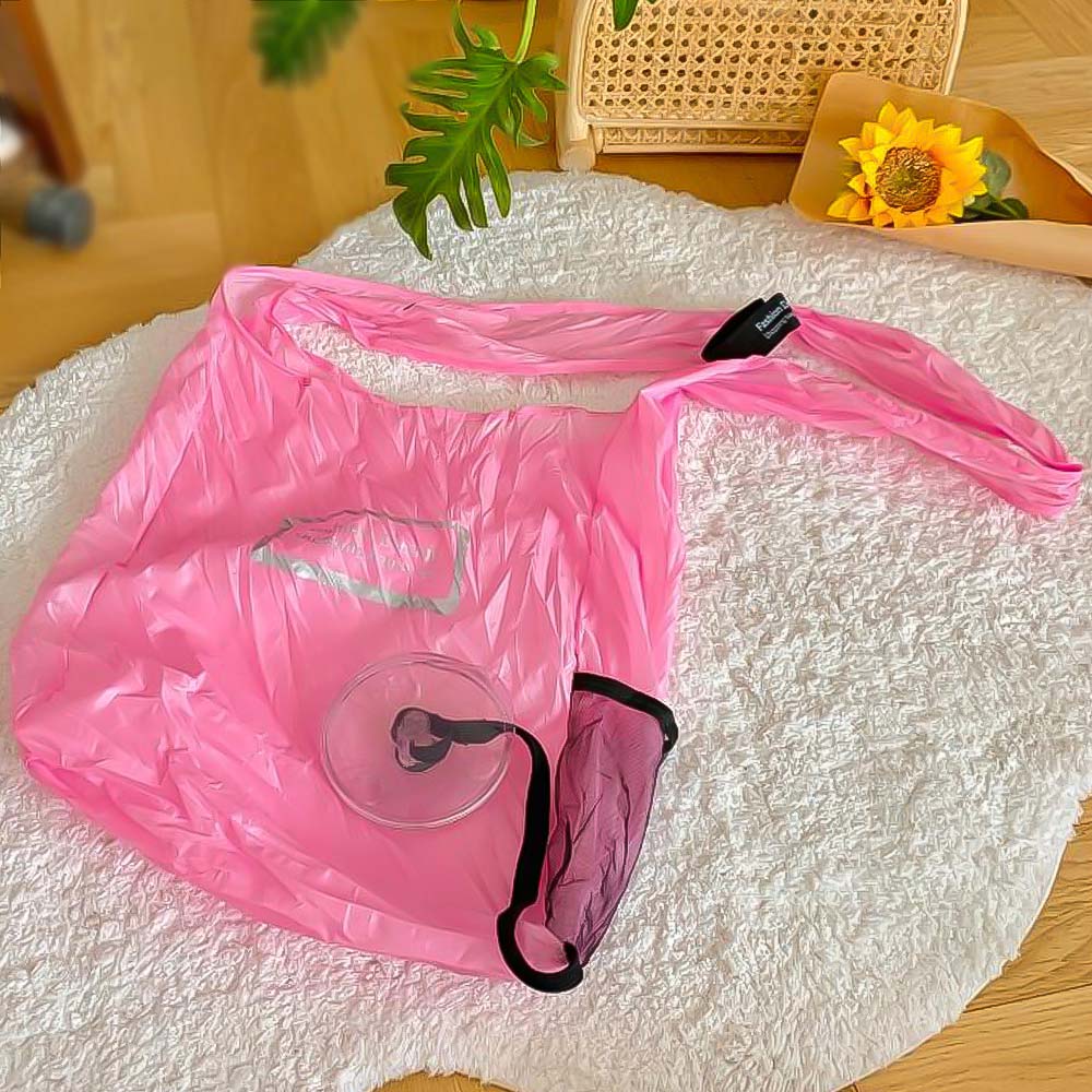 Bolsa ecológica enrollable y reutilizable color rosado para compras
